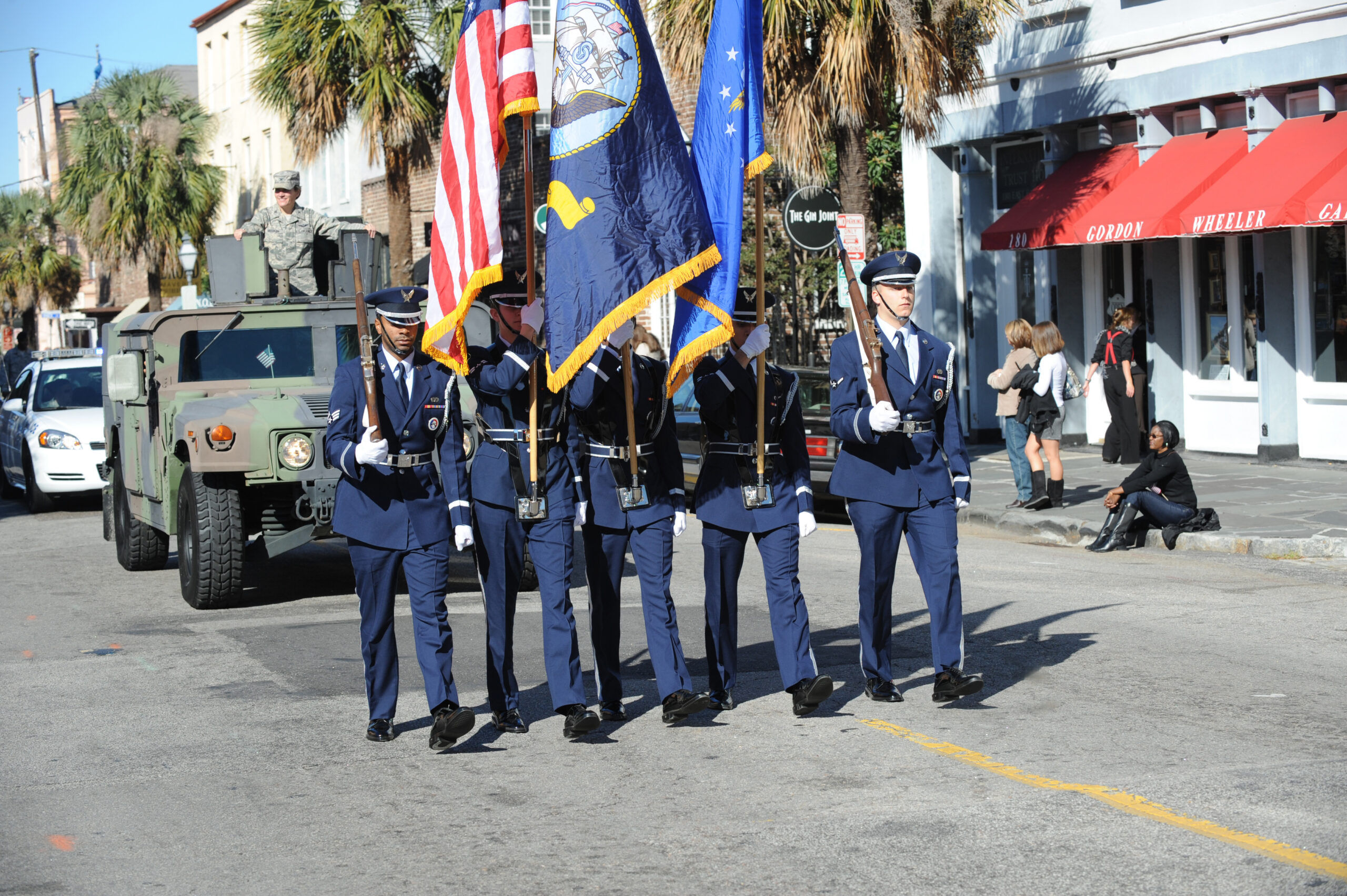 service members participate in veterans day parade
